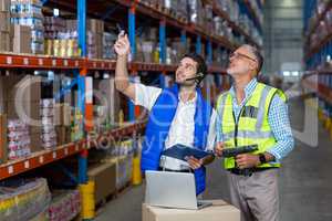 Warehouse workers interacting with each other