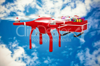 Composite image of flying drone pulling chirstmas sledge