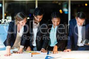 Group of businesspeople looking at the document