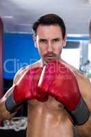 Portrait of serious male boxer