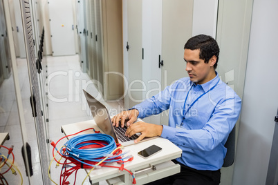 Technician working on laptop