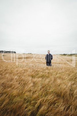 Farmer standing in the field