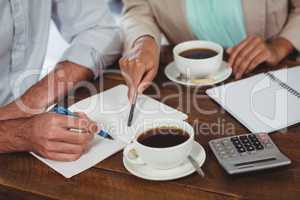 Man and woman meeting over coffee