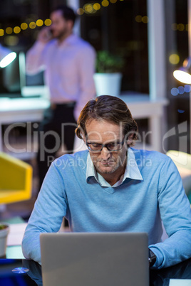 Businessman working on laptop