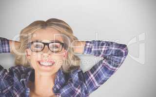 Composite image of portrait of gorgeous smiling blonde hipster lying