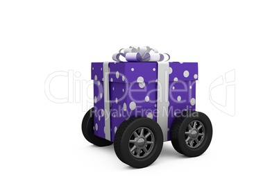 Purple wrapped with polka dot gift box on wheels