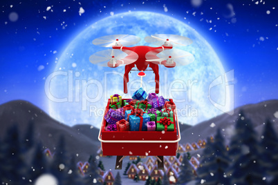 Composite image of digitally generated image of  flying drone pulling chirstmas sledge