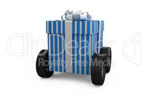 Blue and white striped gift box on wheels