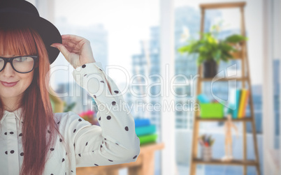 Composite image of attractive smiling hipster woman with hat