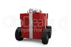 Red gift box on wheels