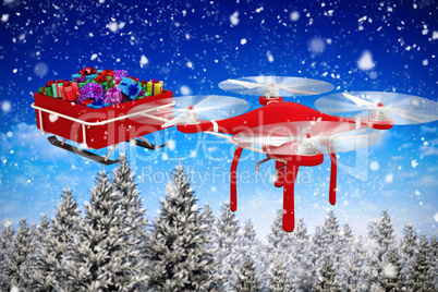 Composite image of high angle view of flying drone pulling chirstmas sledge
