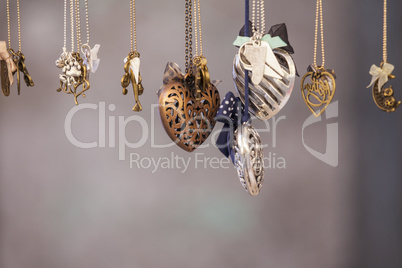 Set of different shape pendants made of metal
