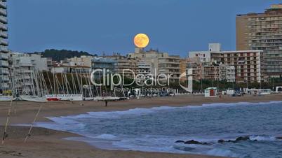 Night picture from village Palamos (Spain) with full moon