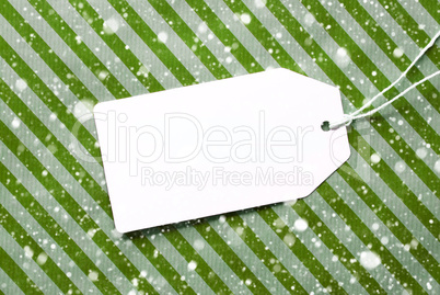 Label On Green Wrapping Paper And Copy Space, Snowflakes