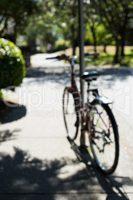 Blur view of bicycle parked in a park