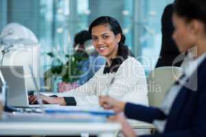 Businesswoman working on laptop