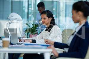 Businesswoman working on laptop