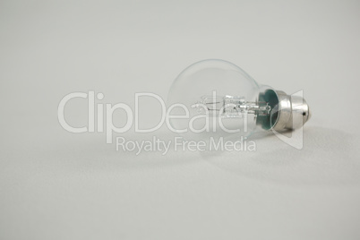 Light bulb against white background