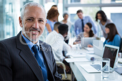 Portrait of businessman in office