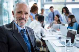 Portrait of businessman in office