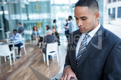 Businessman working on laptop