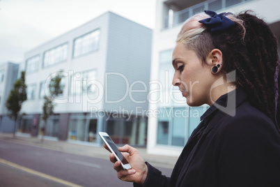 Businesswoman using mobile phone