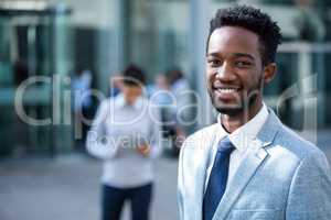 Smiling businessman in office building