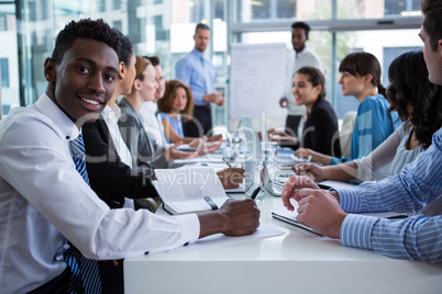 Businesspeople working in office