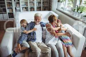 Grandparents having fun with their grandchildren