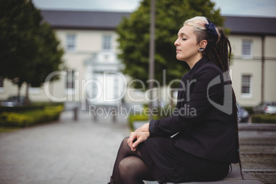 Businesswoman with eyes closed relaxing