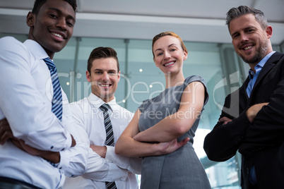 Portrait of businesspeople standing in office