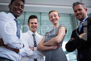 Portrait of businesspeople standing in office