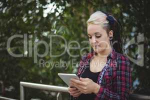 Woman using digital tablet