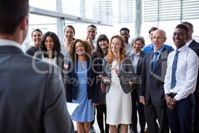 Businessman interacting with colleagues