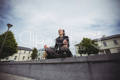 Businesswoman practicing yoga