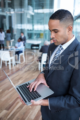 Businessman working on laptop