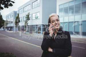 Portrait of businesswoman talking on mobile phone