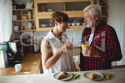 Senior couple having breakfast