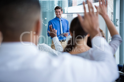 Businessman interacting with colleague