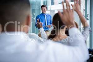 Businessman interacting with colleague