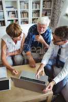 Senior couple planning their investments with financial advisor