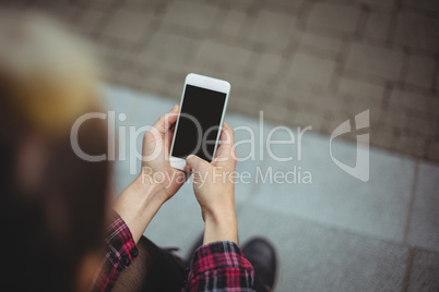 Woman using mobile phone