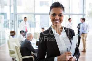 Smiling businesswoman in office