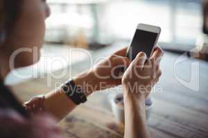 Woman using mobile phone