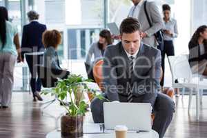 Businessman working on laptop