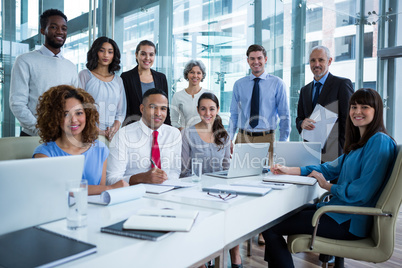 Smiling business people in office Smiling business people in office