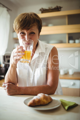 Senior woman having breakfast