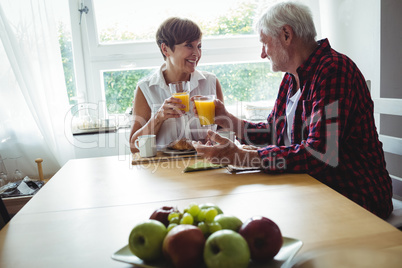 Senior couple having breakfast