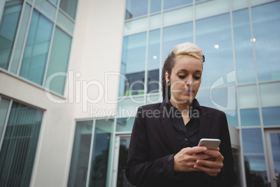 Businesswoman using mobile phone