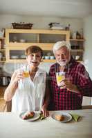 Senior couple having breakfast